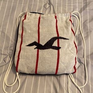 Striped Drawstring Backpack Towel with Hollister Logo